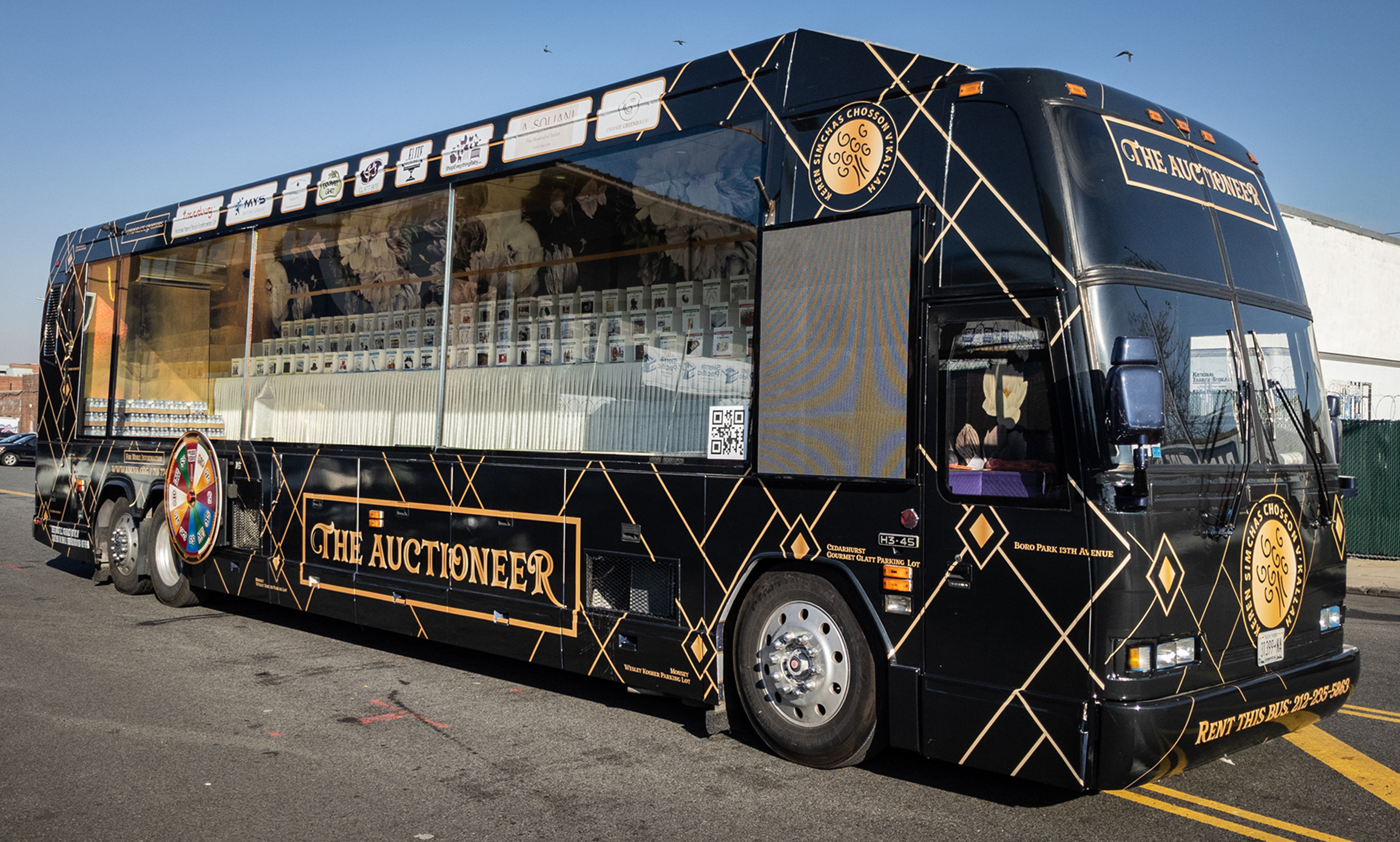 The Auctioneer / Annual Auction Bus Wrap Design